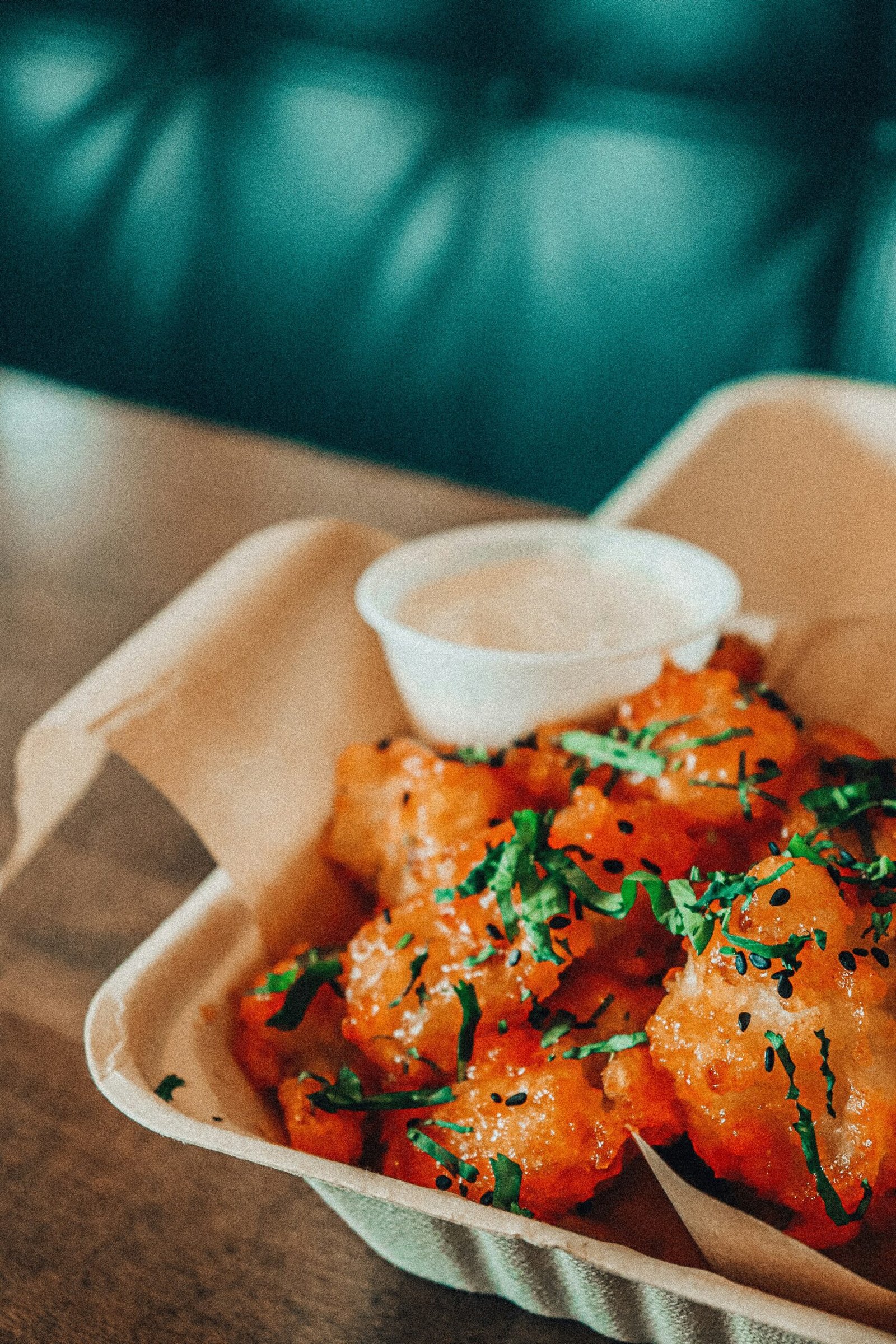 orange sauce on white ceramic bowl